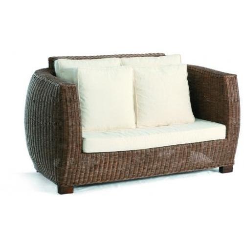 Colonial inspired Domus Ventures Antequera Wicker Loveseat With Cushion