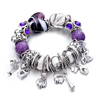 Bracelets - purple heart dangle many small items bracelet Image.