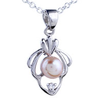 Pendants - pink freshwater pearl in crown set pendant sterling silver Image.