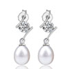 Dangle Pearl And Crystal Earrings